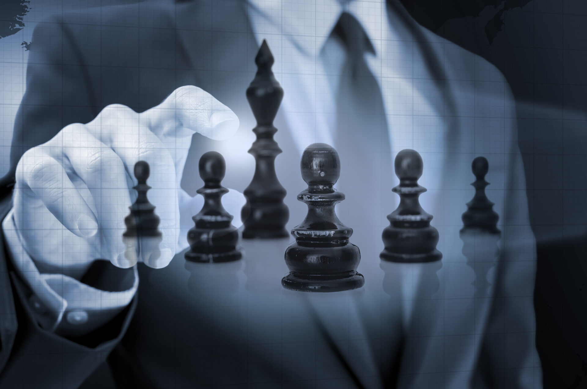 Businessman navigating chess figures in virtual space. Concept of business strategy.